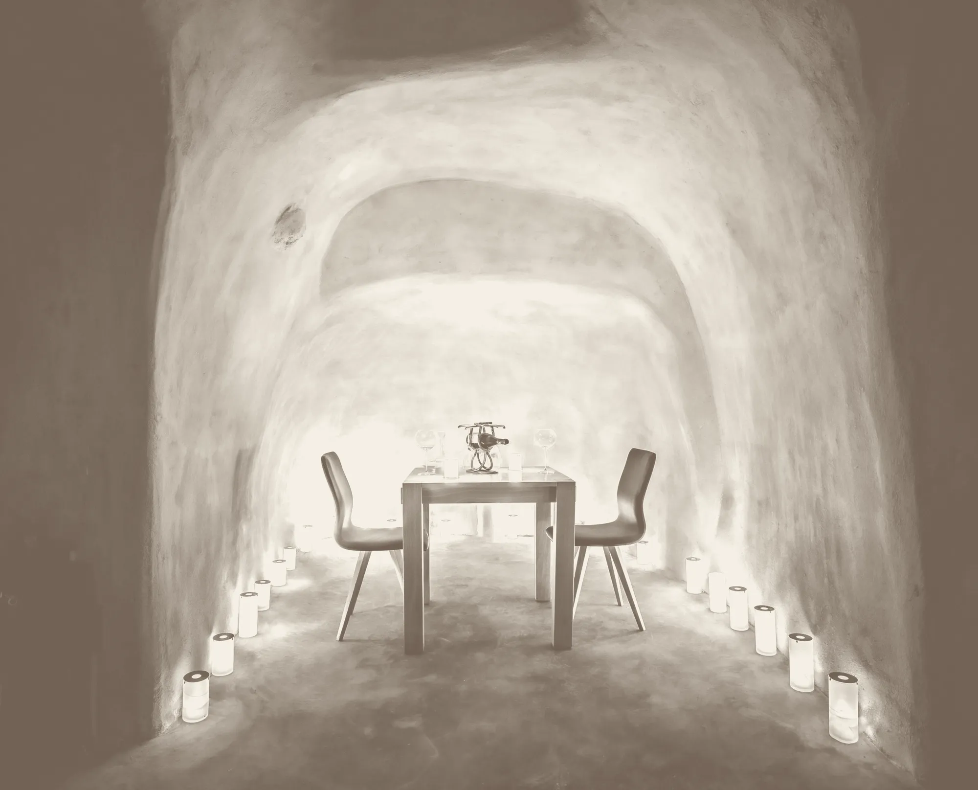 A table set for two in the candlelit canava